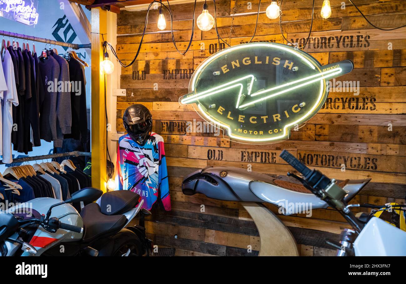 A neon illuminated sign showing the logo of the English Electric Motor