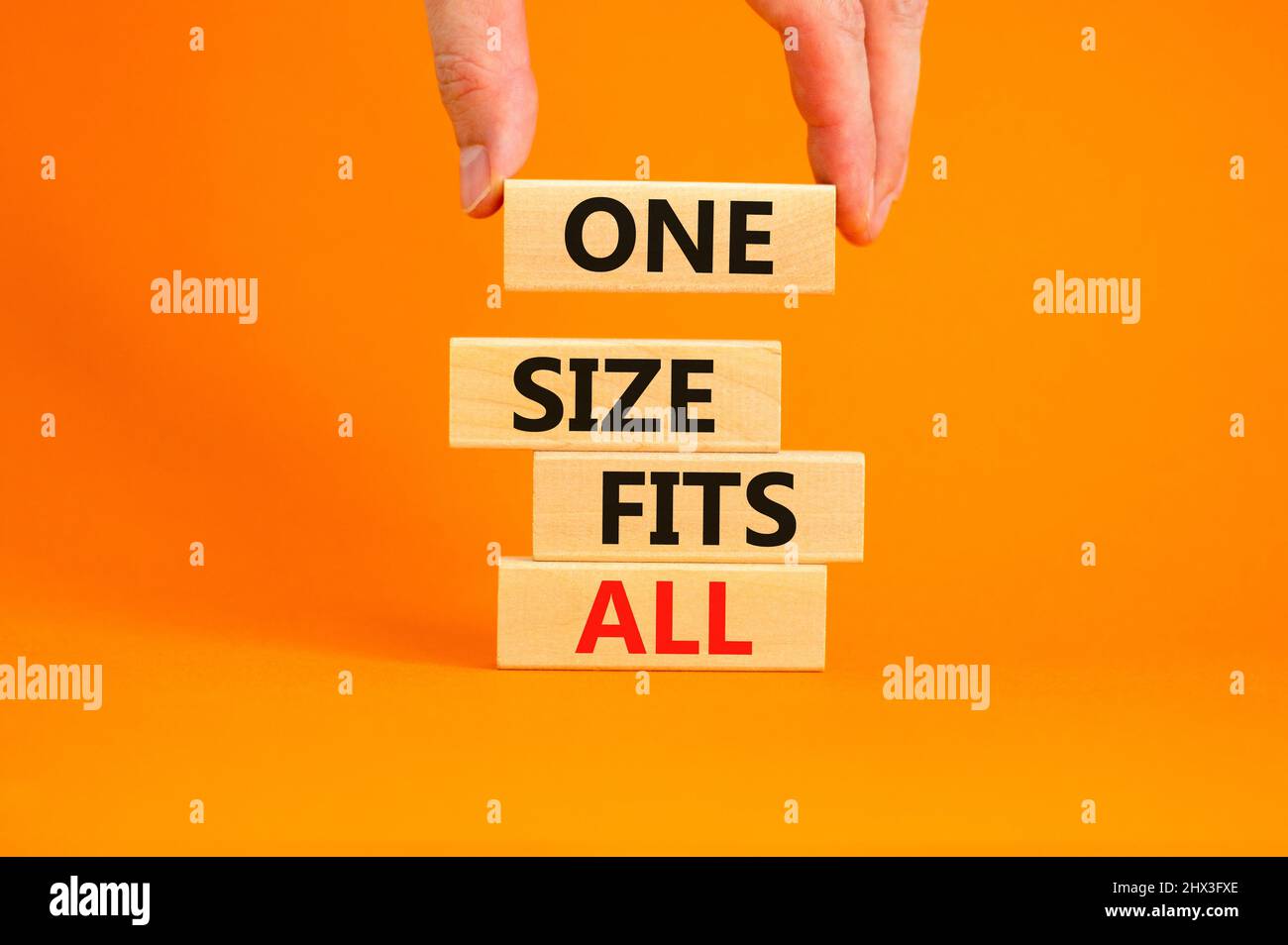 One size fits all symbol. Concept words One size fits all on wooden