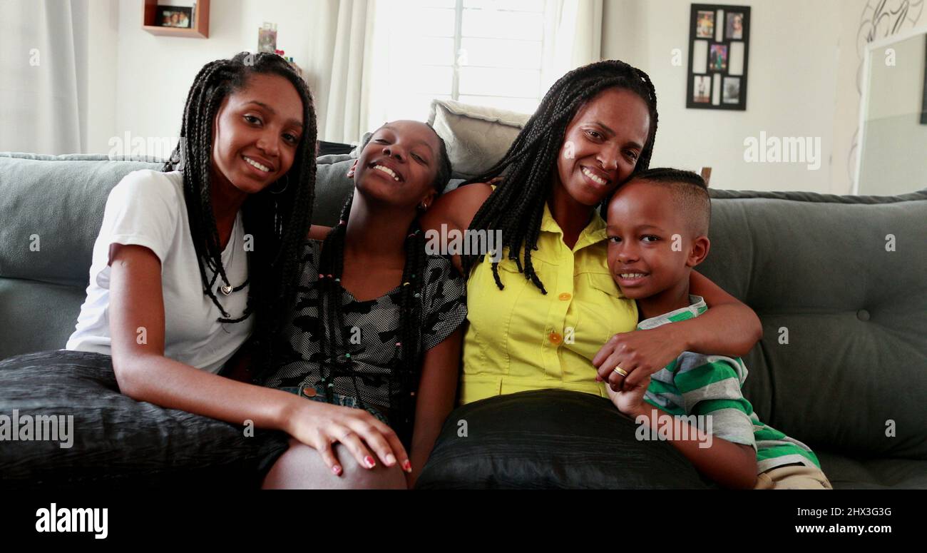 Black African mother and teen daughters and little boy son together at ...