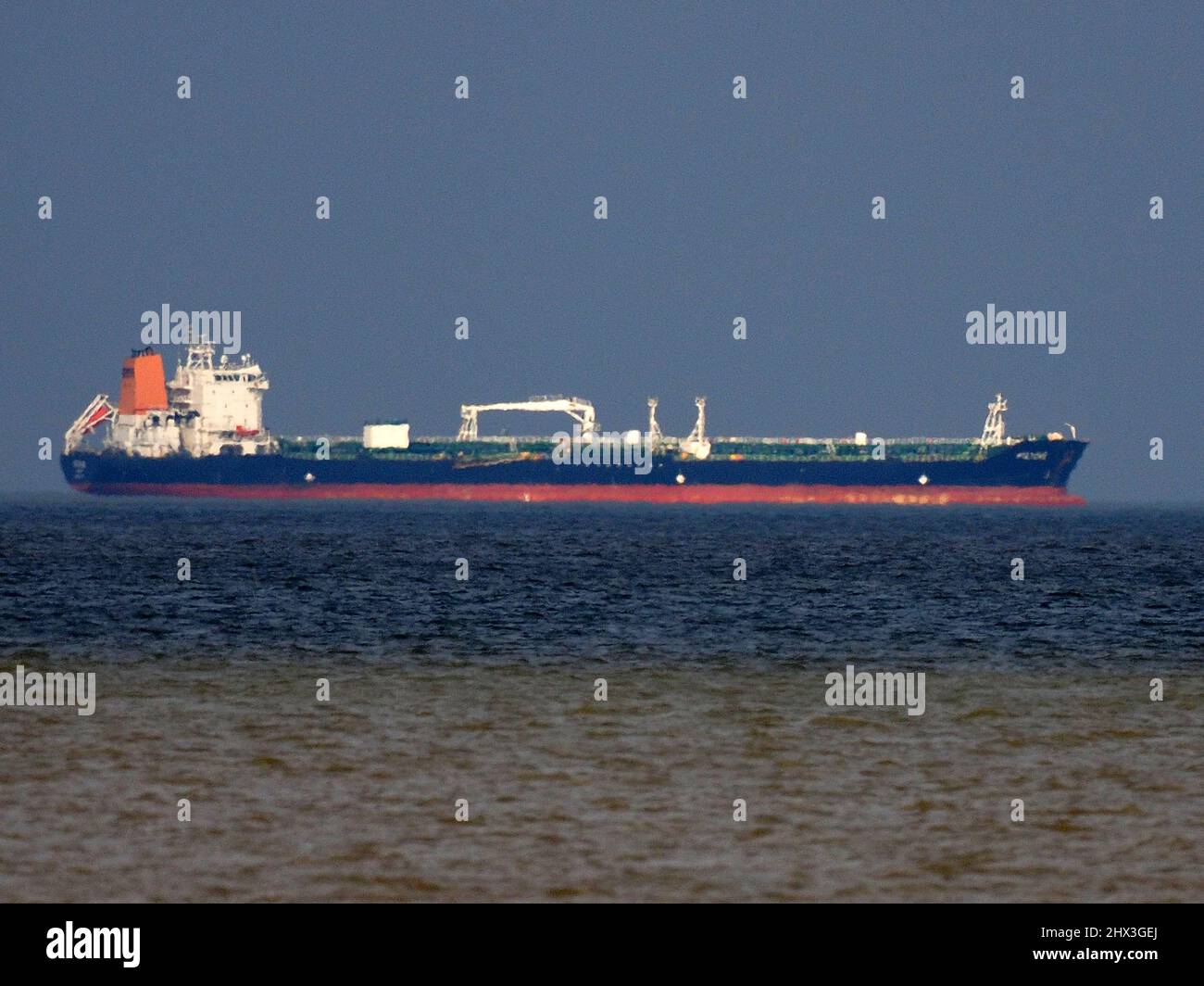 Sheerness, Kent, UK. 9th Mar, 2022. Surging fuel prices. Two oil tankers off the coast of Sheerness, Kent this afternoon. Pic: oil/chemical tanker 'PILTENE' anchored off Sheerness this afternoon.  James Bell/Alamy Live News Stock Photo