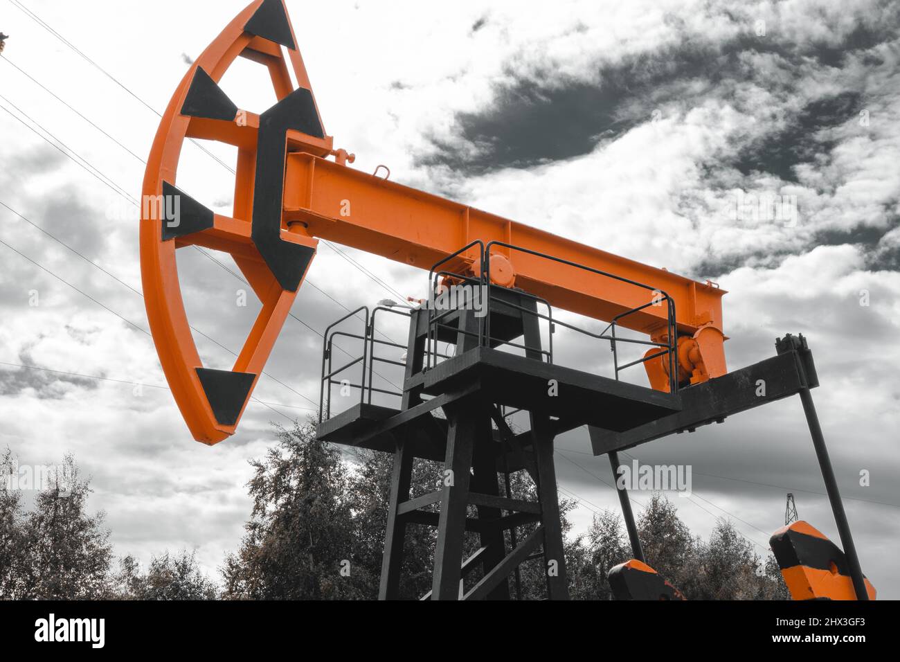 Drilling rig in an oil field. Extraction of oil from underground. Oil