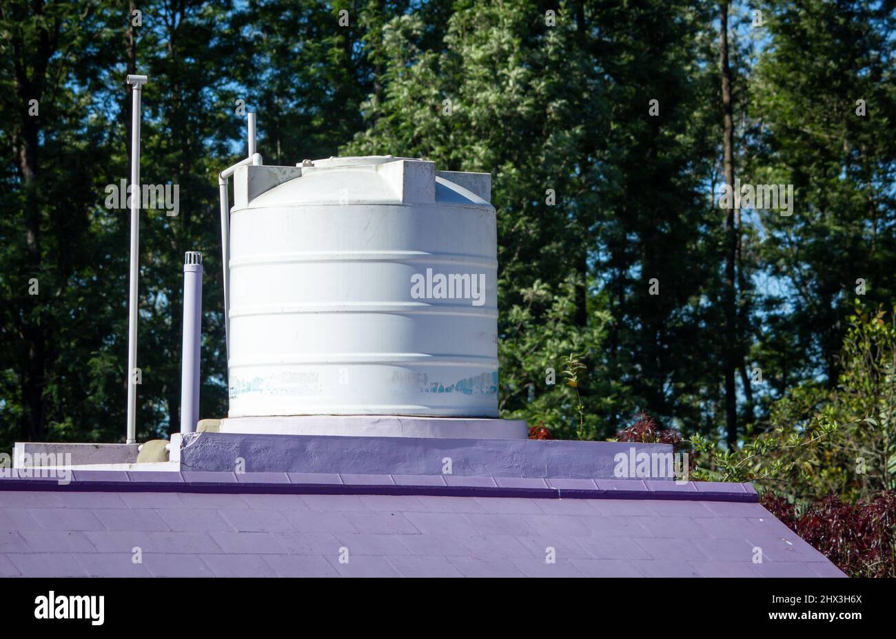 View of overhead water tank for storing the water needs for the house