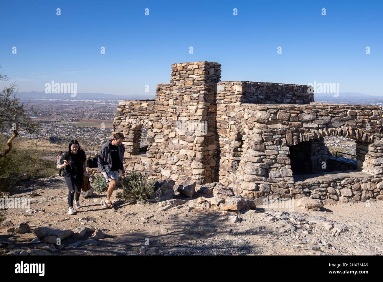 Dobbin's Lookout is perched atop Phoenix, Arizona's famed South Mountain Park, and provides sightseers with a phenomenal view of the city. Stock Photo