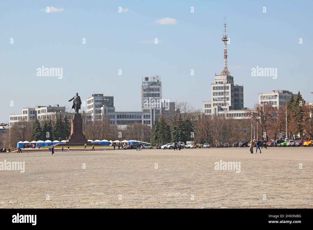 KHARKOV, UKRAINE - APRIL 17, 2013: This is the Liberty Square with the building of the State Industry, built in the style of constructivism of the 30s Stock Photo