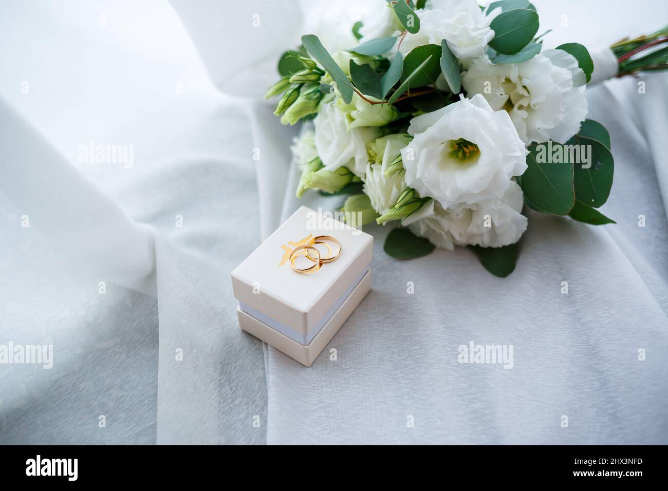 gold wedding rings on the wedding day for the newlyweds. Jewelry from