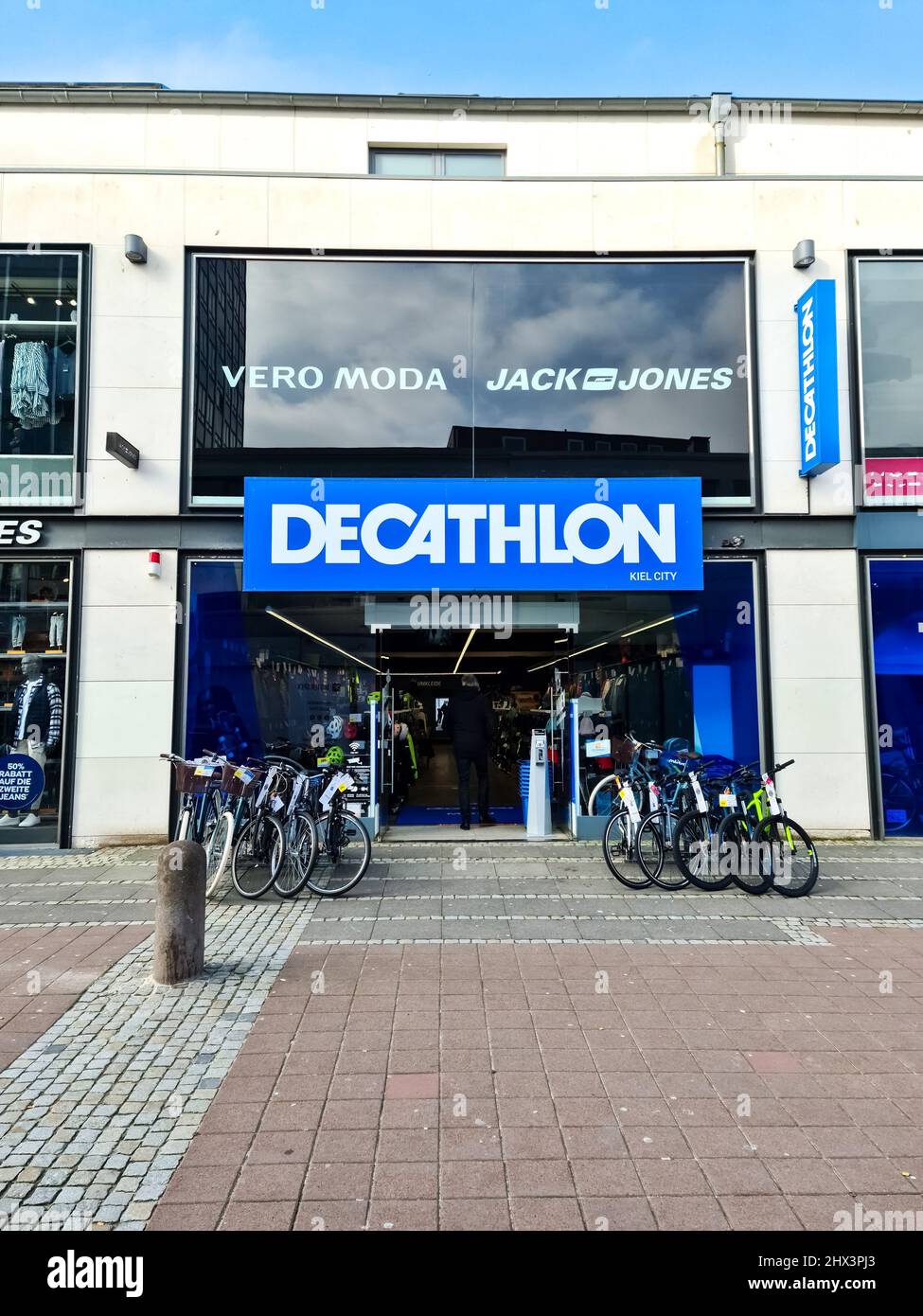 Entrance of Decathlon brand sports store with big blue logo over entrance Stock Photo