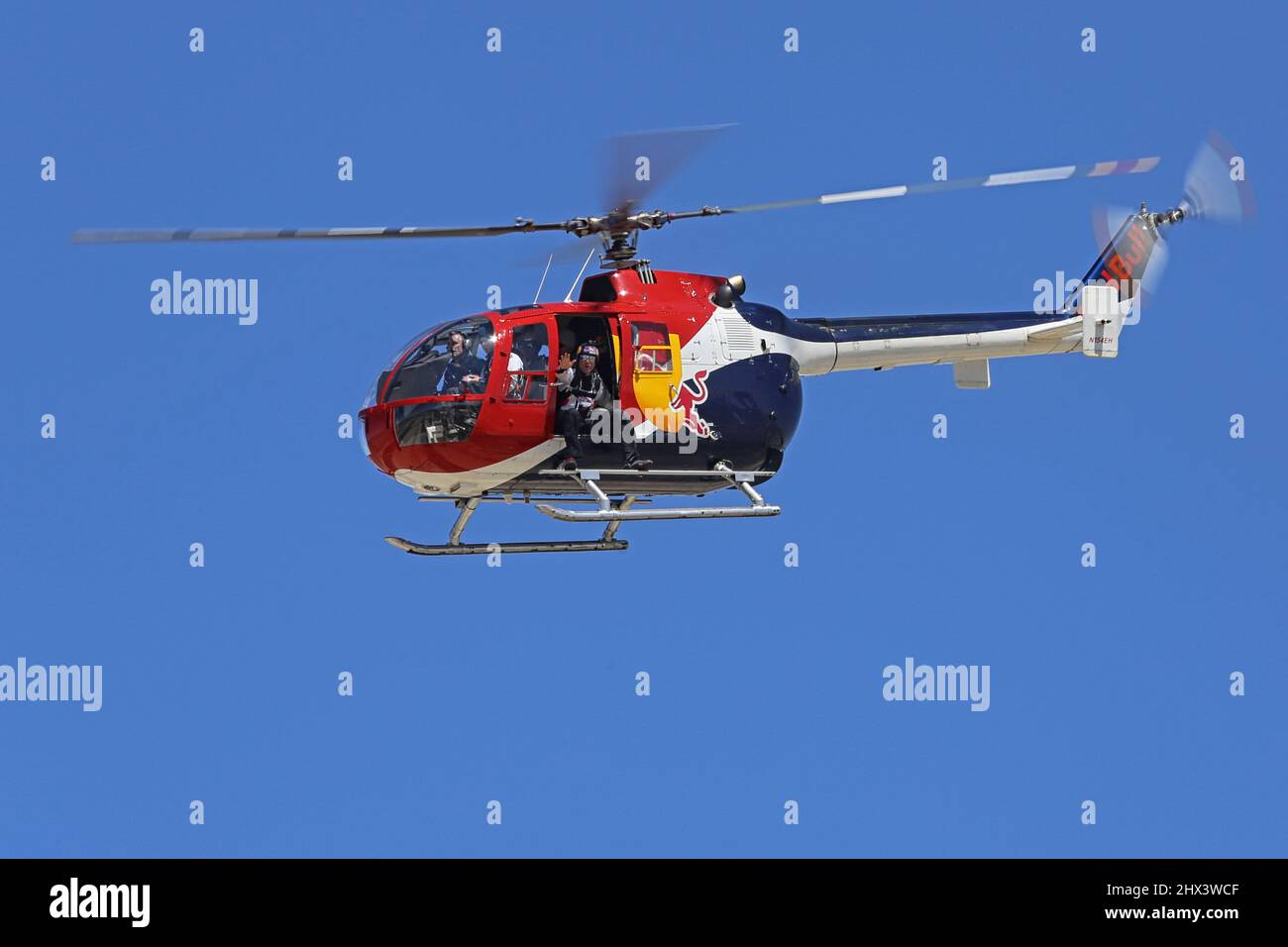 Lancaster, CA / USA - March 25, 2018: A modified Messerschmitt-Bolkow-Blohm Bo-105 CBS4 helicopter, operated by Red Bull, is shown during an air show. Stock Photo