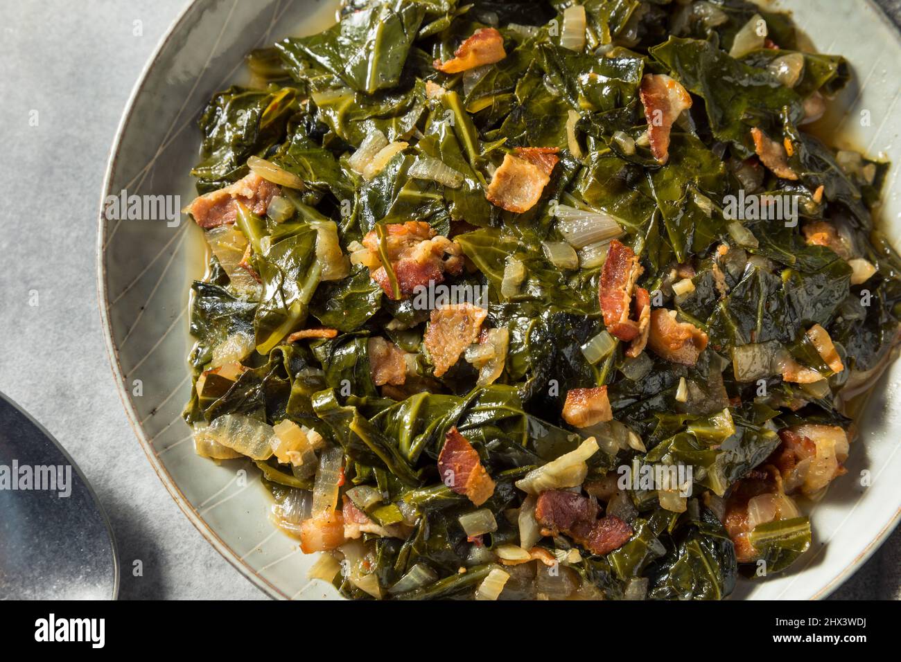 Homemade Southern Sauteed Collard Greens with Onion and Bacon Stock ...
