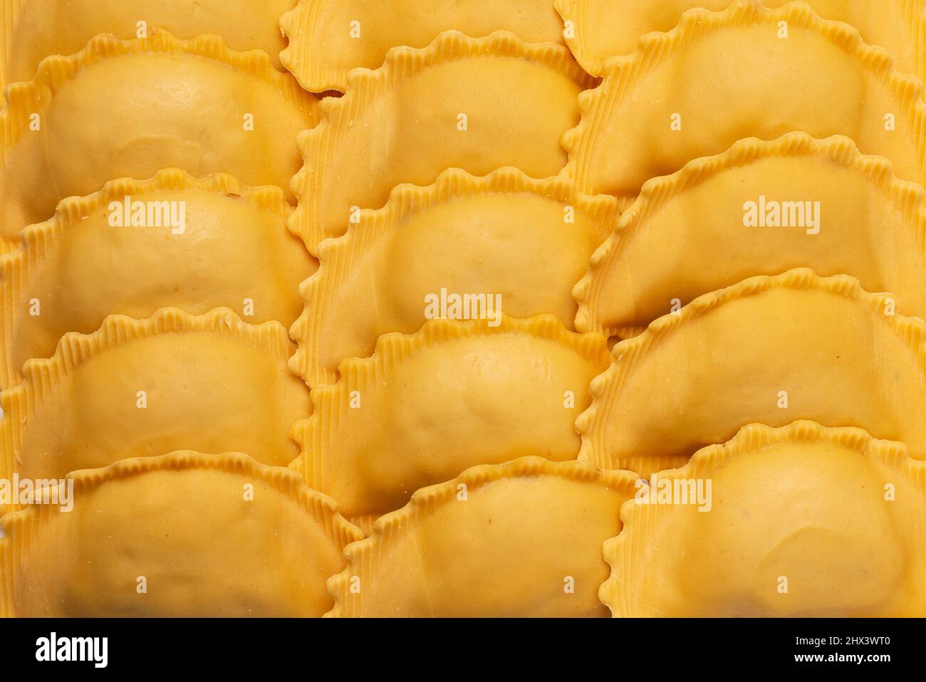 Raw ravioli as a background. Healthy italian food Stock Photo - Alamy