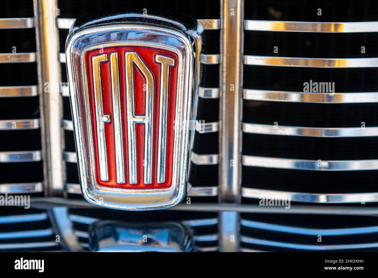 Benevagienna, Cuneo, Italy - April 10, 2016: close up of vintage Fiat brand logo on auto Fiat 1500 of year 1968 Stock Photo