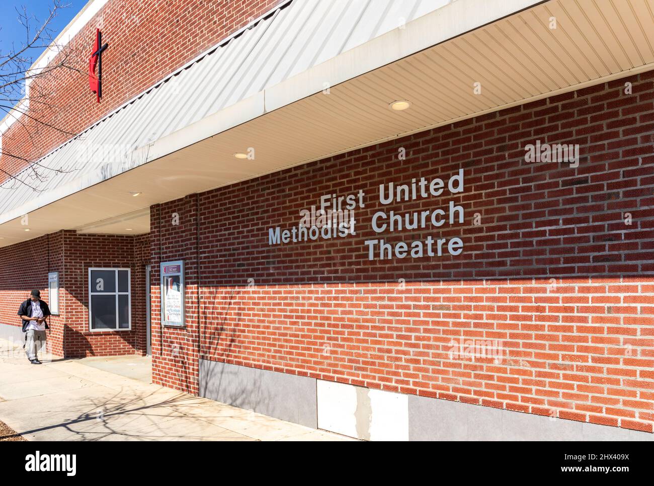 GASTONIA, NC, USA-3 MARCH 2022: First United Methodist Church Theatre, diagonal front view, with one man entering the building. Stock Photo