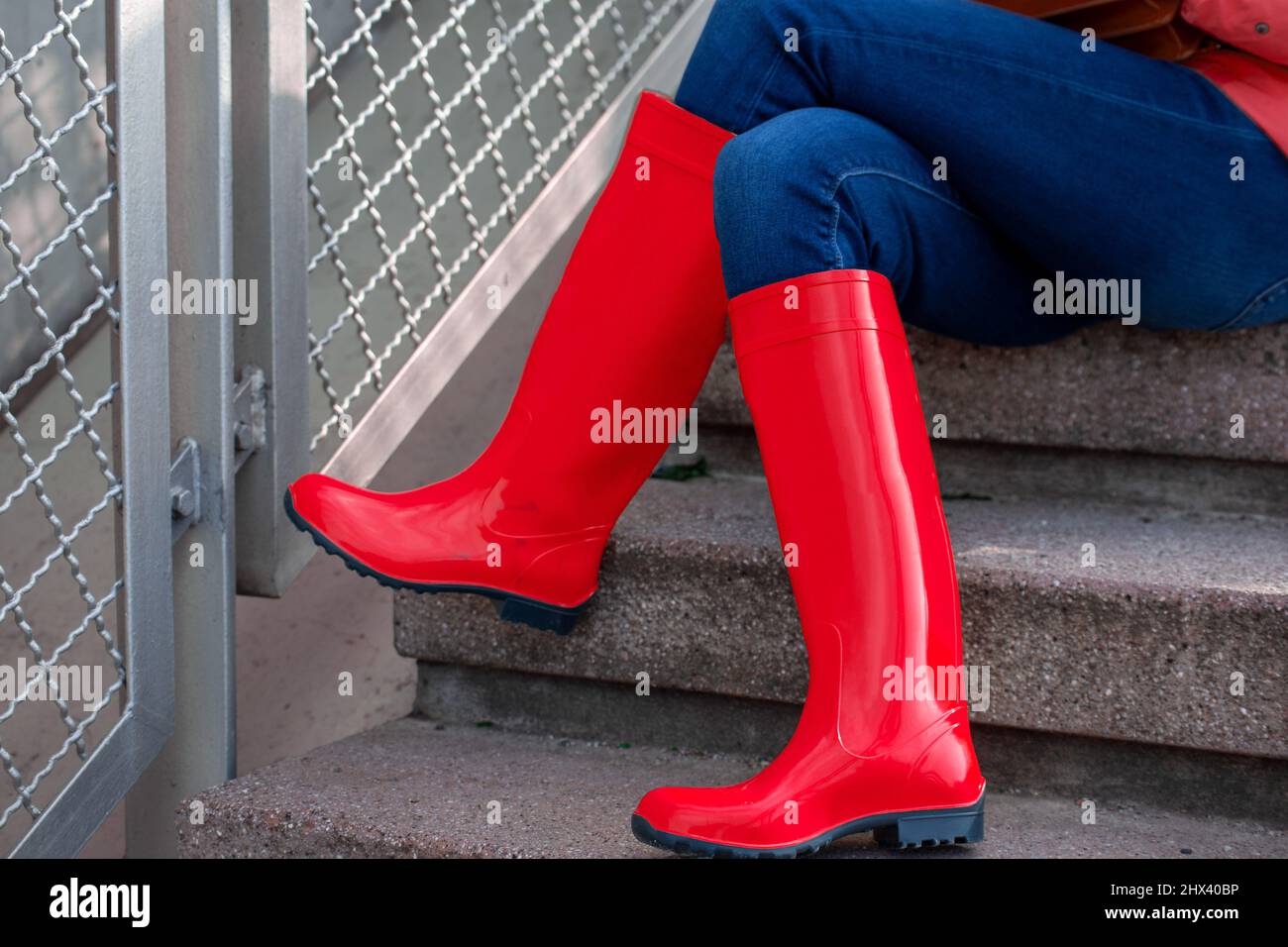 Woman with red rubber boots (model released Stock Photo - Alamy