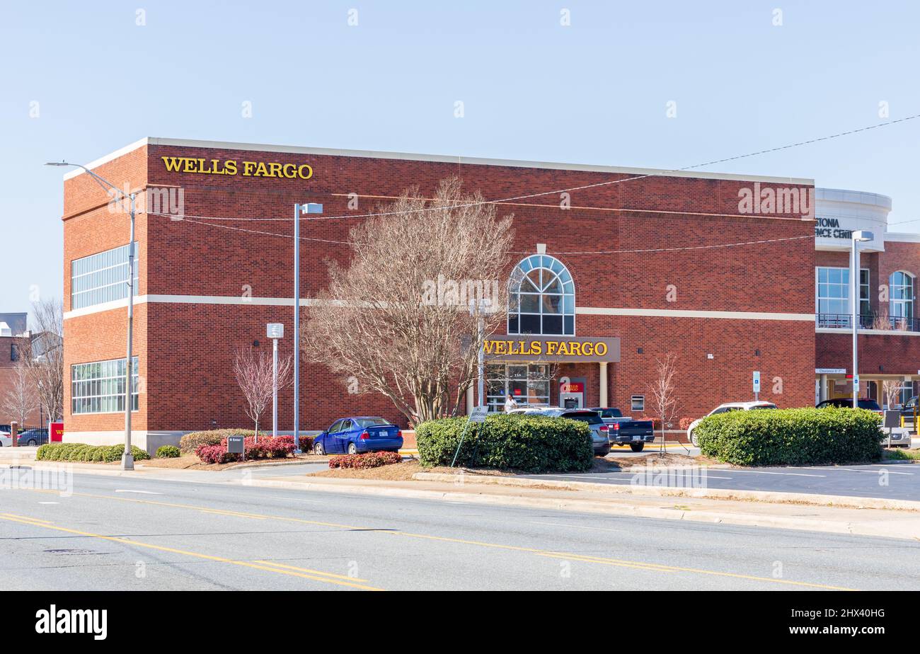 GASTONIA, NC, USA-3 MARCH 2022: Rear view of the Wells Fargo bank building and signs. Stock Photo