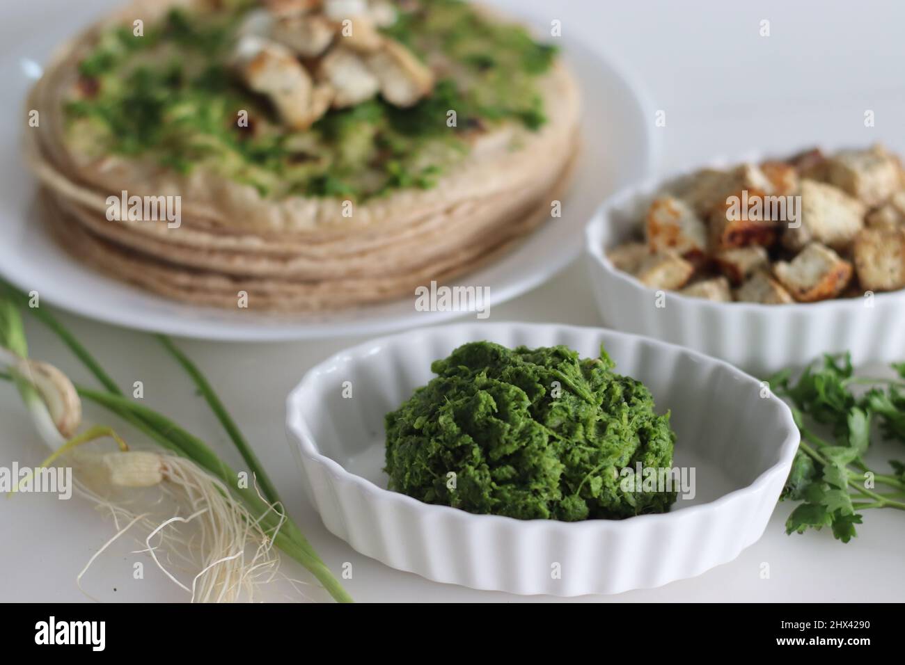 Spicy green garlic condiment, made with spring garlic, coriander leaves, green chillies and