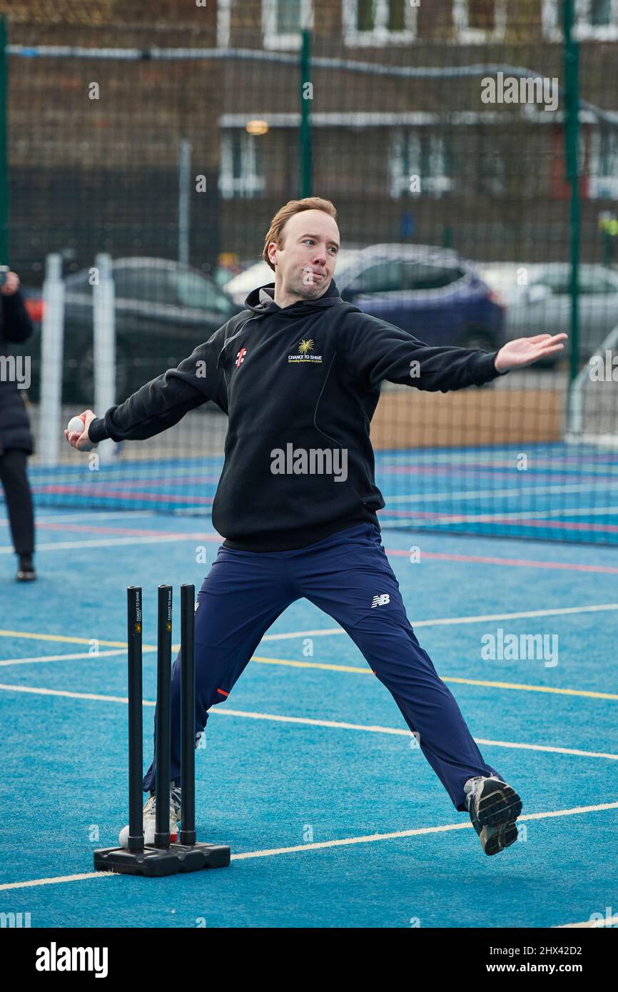 Matt Hancock playing charity street cricket Stock Photo