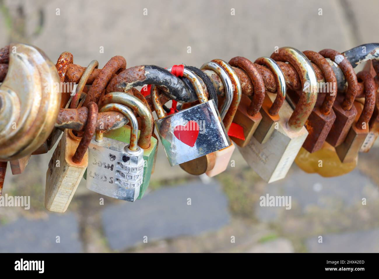 Love locks / padlocks along the promenade at Pier Head, Liverpool Stock