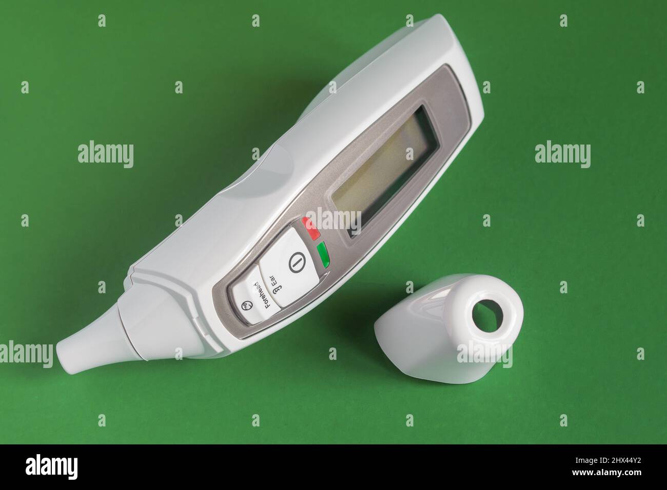 buitenste Geven Leggen Infrared Forehead and Ear Thermometer for Baby, Adults, Hospital with Fever  Alarm isolated with the cap removed on colorful studio background. Object  Stock Photo - Alamy