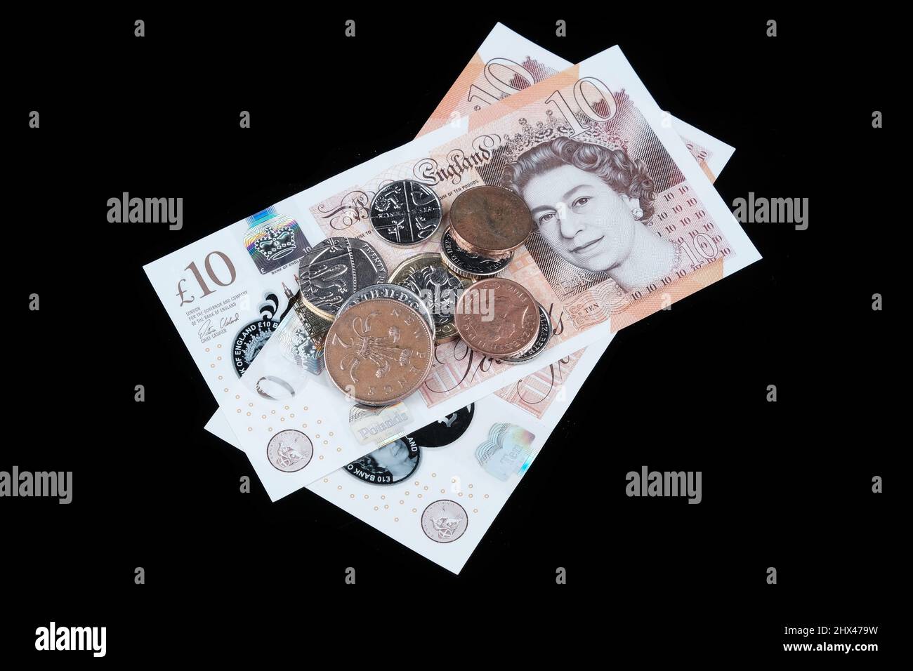 British Money (Cash) on Black Background Stock Photo