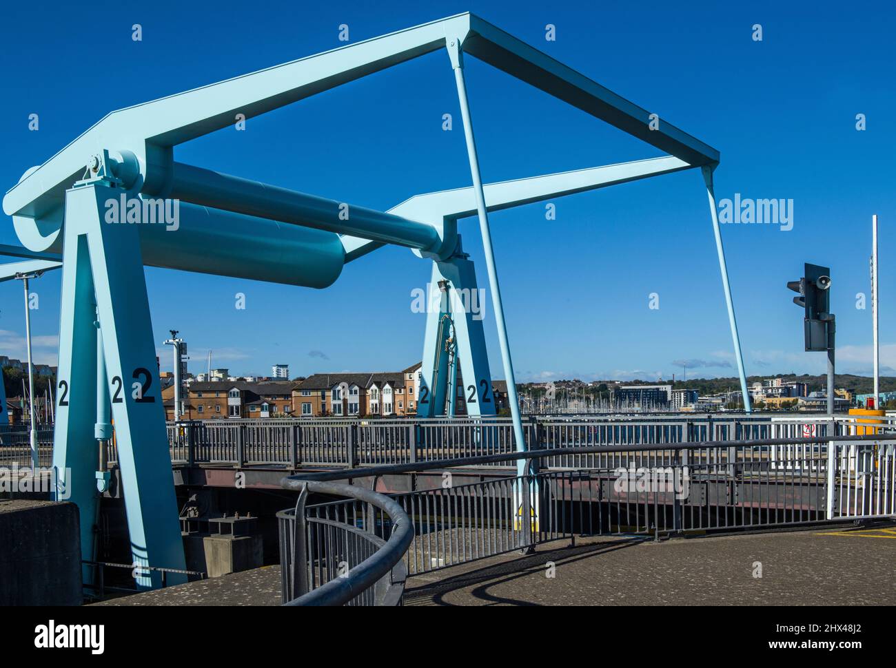 A photograph of just one of the three bascule bridges on the Cardiff Bay barrage on a sunny September day Stock Photo