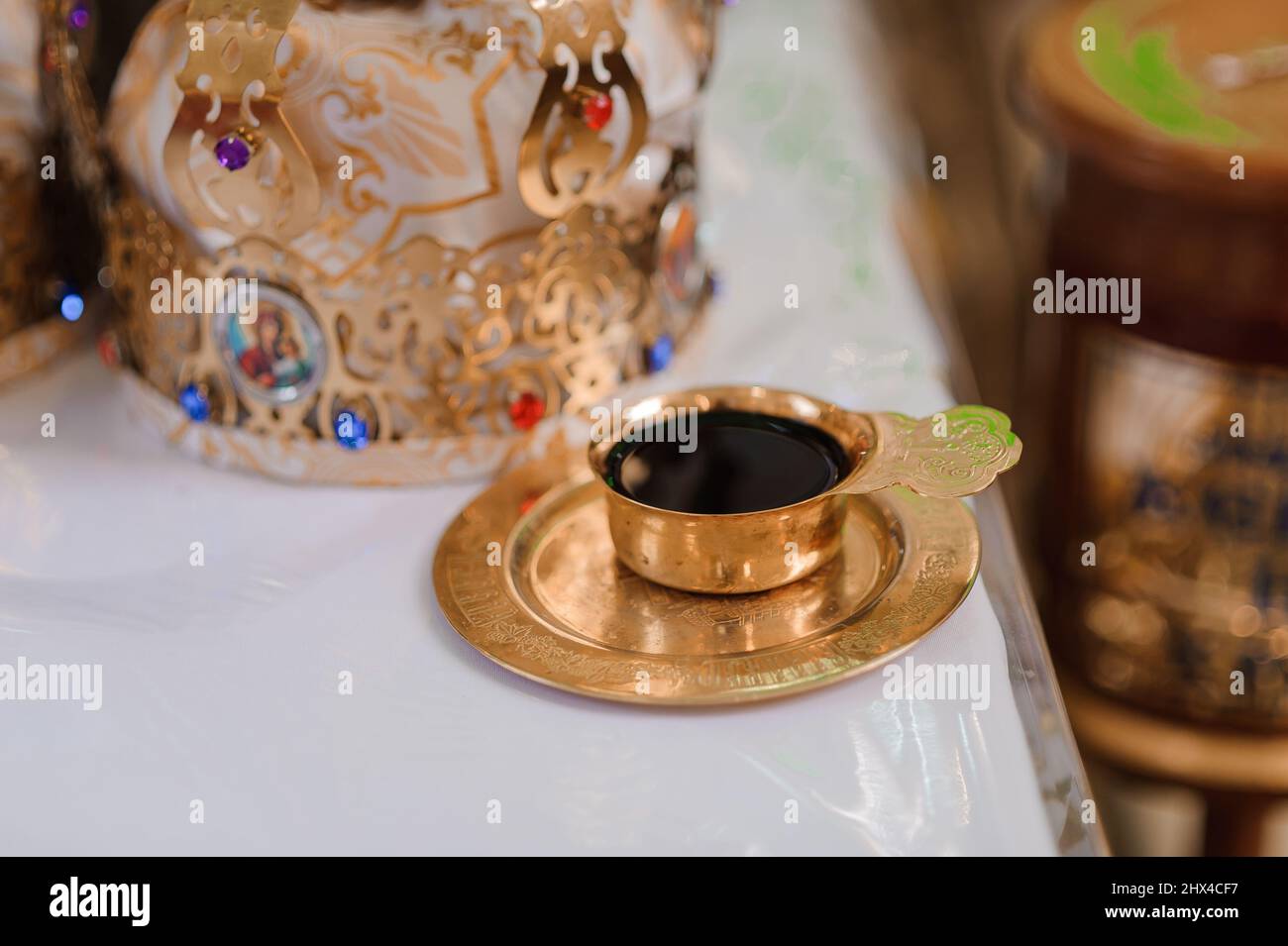 Wedding in the church. Wine traditions Stock Photo