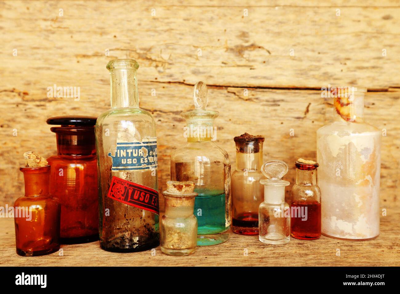 Antique Medicine Bottles, Victorian Era, on a original 1800s wooden