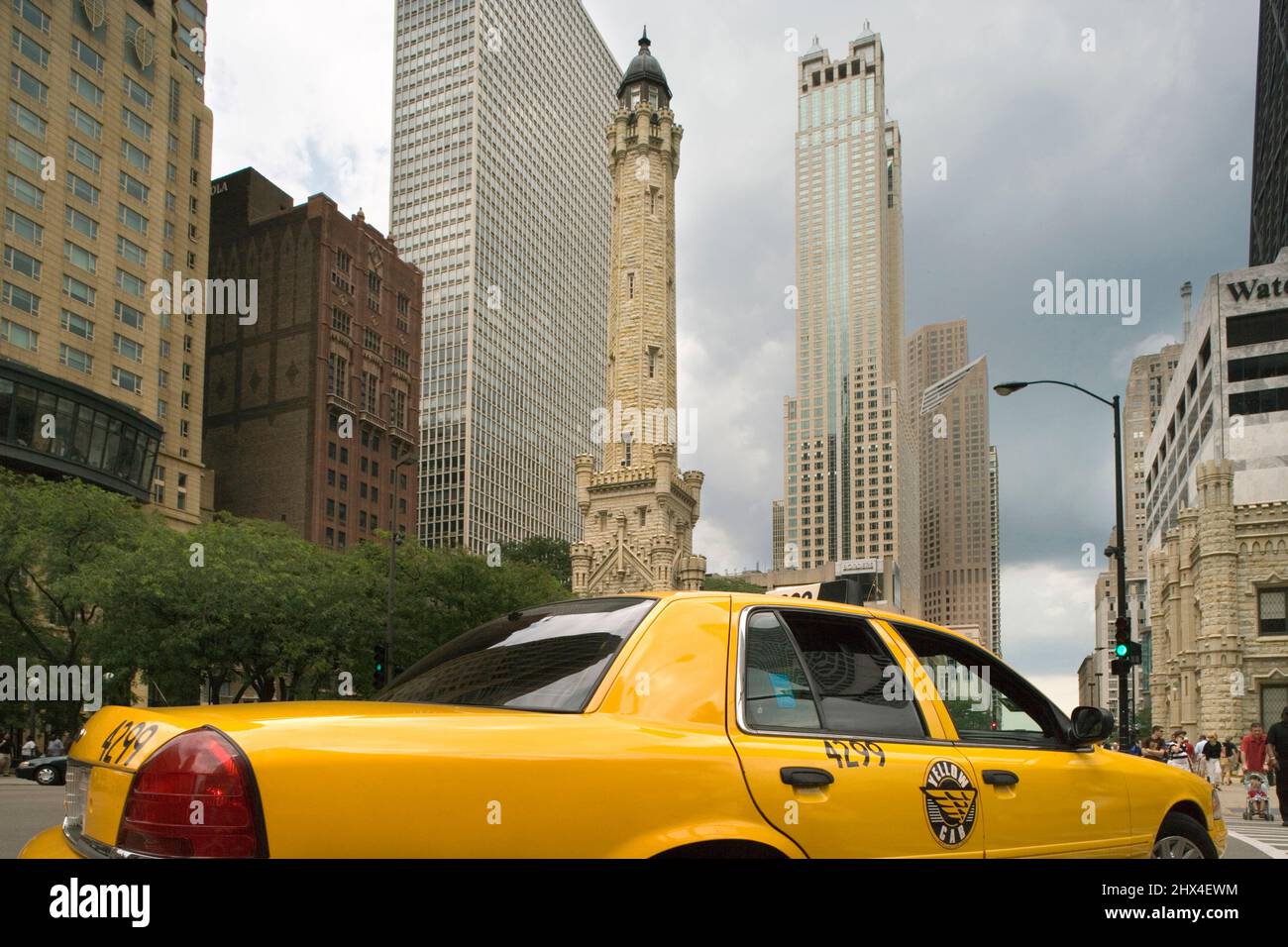 YELLOW TAXI CAB (©FORD MOTOR CO 1995) WATER TOWER MICHIGAN AVENUE CHICAGO  ILLINOIS USA Stock Photo