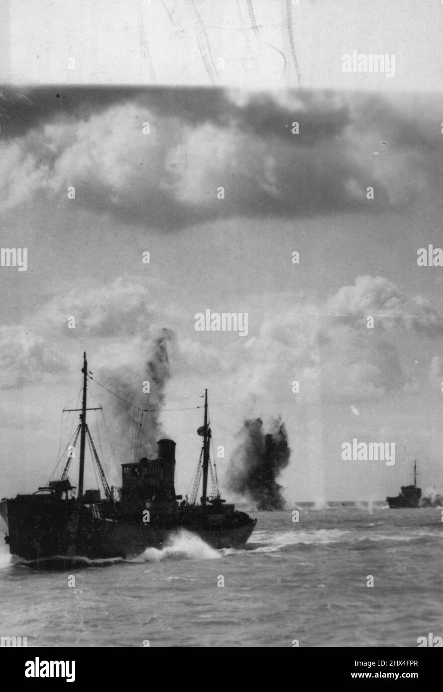 Channel Convoy Shelled By The Germans: Another burst closer, between two ships but still another miss. ***** pictures of the Channel convoy shelling taken from one of the escorting warships, they show how the German Gunners tried to find the range. and missed. November 05, 1940. (Photo by Keystone). Stock Photo