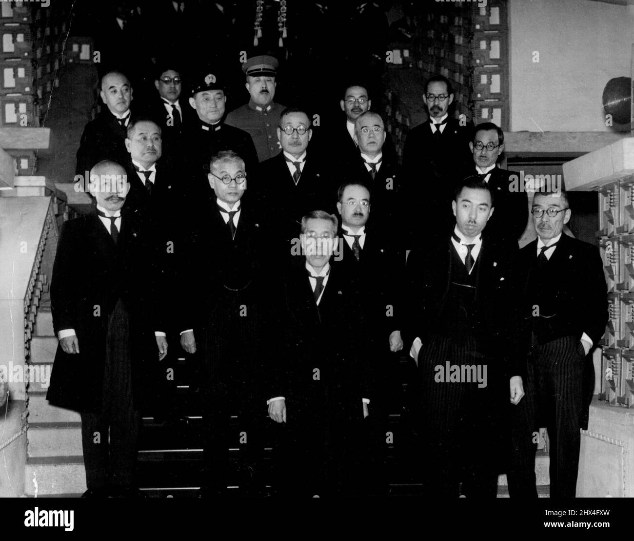 Baron Kiichiro Hiranuma Heads New Cabinet Of Japan -- The first photograph taken of the new cabinet of Japan, headed by Premier Baron Kiichiro Hiranuma, which came into existence this evening at 7:30 o'clock with the investiture of its members by the Emperor, following the resignation of the Konoye Cabinet on the morning of January 4th. Its first meeting was held at 8:15 o'clock, at the Premier's official residence, at which it approved the Premier's statement pledging continuance of the former, Konoye cabinet's policies on the Sino-Japanese affairs.Left to Right: (front row) Baron Kiichiro Hi Stock Photo
