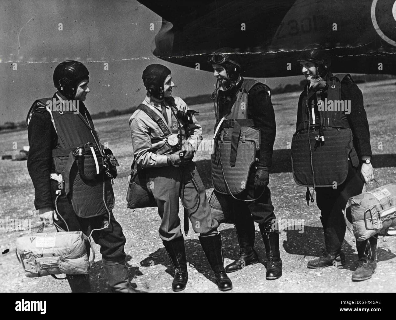"Flak Suits" are now issued to R.A.F. air crews in Britain. A Boston