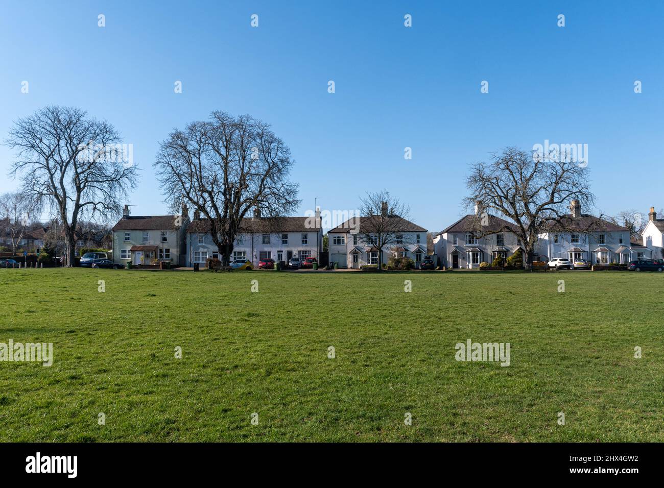 The Butts, a triangle of grass, open space for informal pursuits and visits of travelling fairs, in Alton town, Hampshire, England, UK Stock Photo