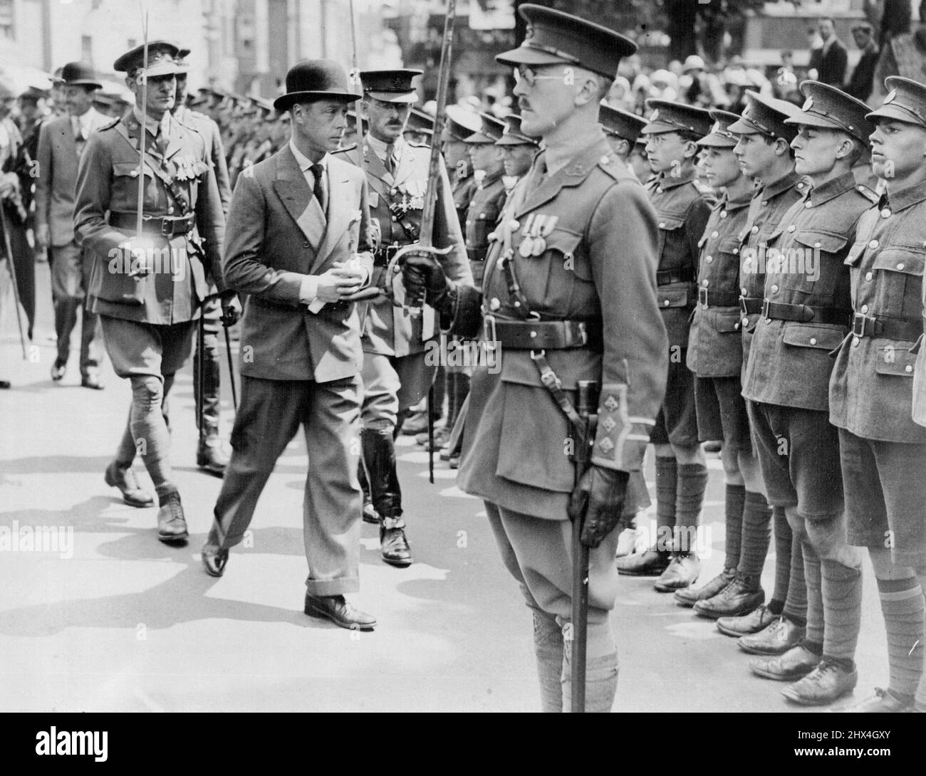 Prince of Wales at Eastbourne. The Prince of Wales flew to Eastbourne this morning on a visit to the town. Photo Shows: The Prince of Wales inspecting the Guard of Honour at Eastbourne Town Hall. June 30, 1931. (Photo by Wide World Photo). Stock Photo