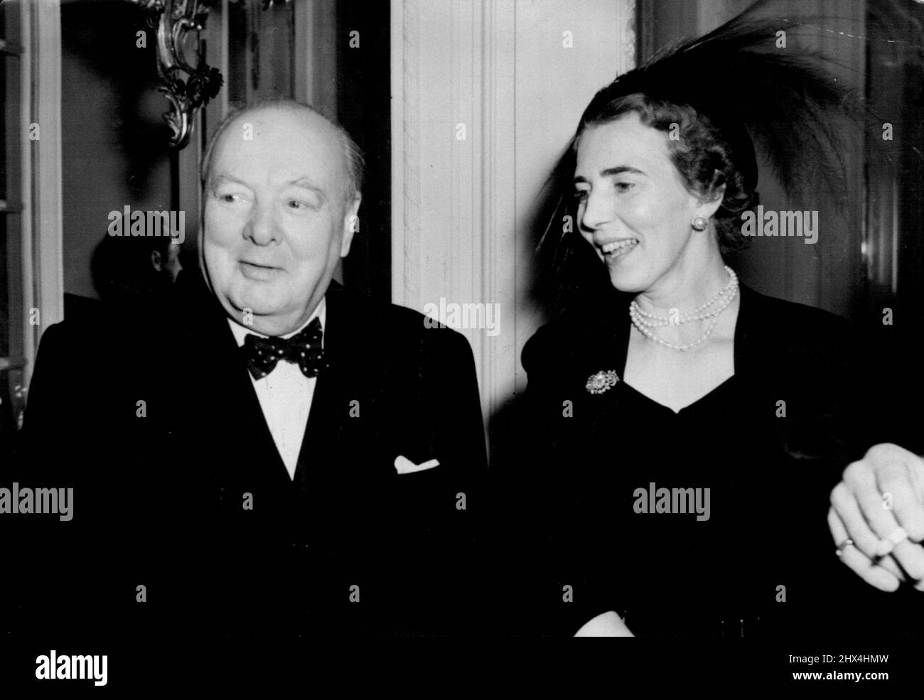 Winston's Birthday Smile - Mr.Winston Churchill ' s 75th birthday smile when he was pictures at the luncheon with Queen Ingrid of Demark. Mr. Winston Churchill, who is celebrating his 75th birthday, was guest of honour at a luncheon given at the Danish Embassy, Pont street, London, to-day (Wednesday). The King and Queen of Denmark, at present visiting England, and Mr. Clement Attlee, British premier, were present. November 30, 1949. (Photo by Reuterphoto). Stock Photo