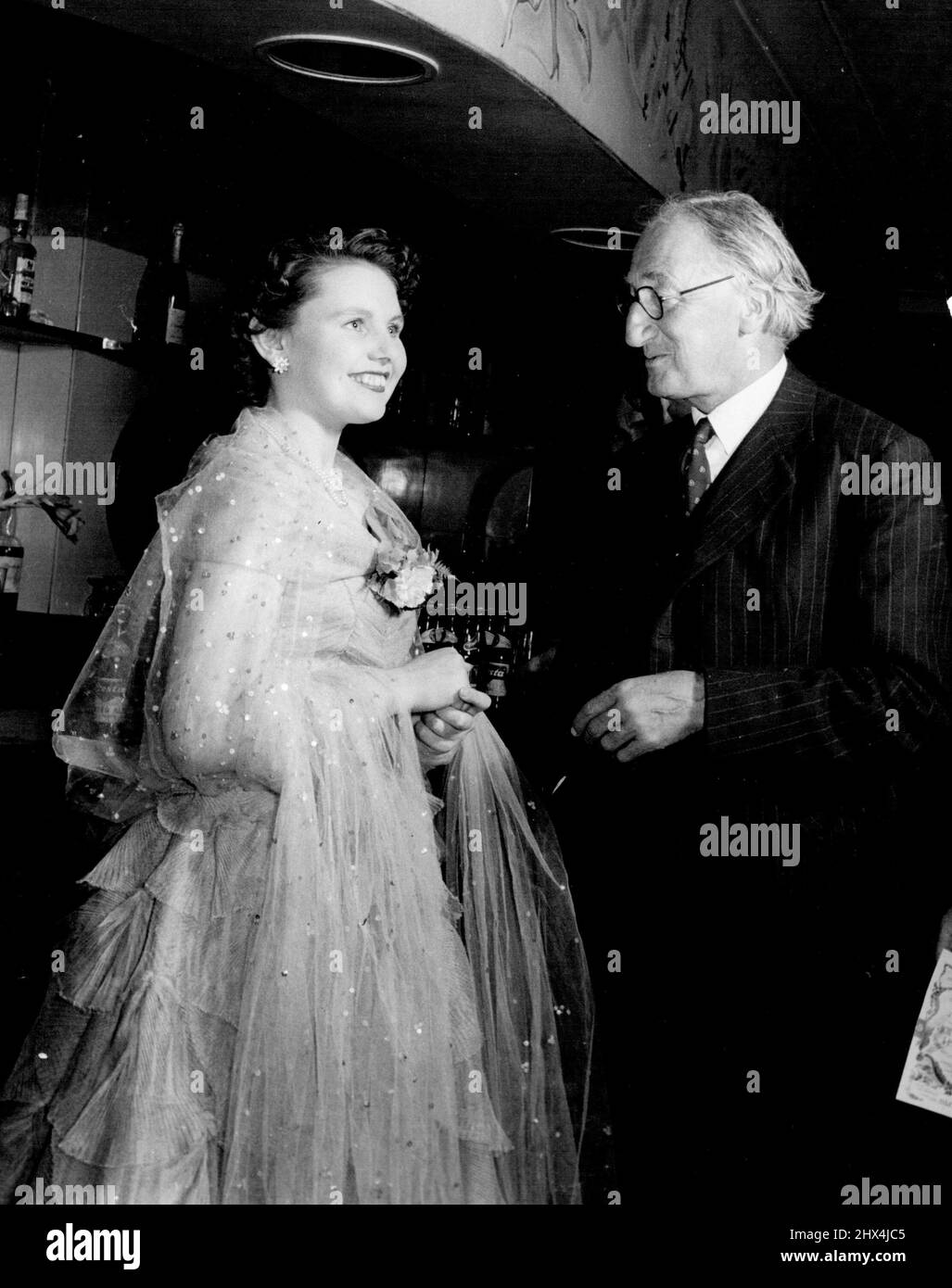 Textile Queen Comes to Town. Before the curtain rose on 'Tough at the Top' at the Adelphi, Muriel met the co-playwright. Mr. A.P. Herbert, M.P. July 12, 1951. (Photo by The Central Office Of Information, London). Stock Photo