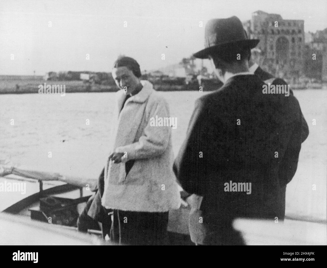 Mrs. Simpson Goes Fishing. Mrs. Simpson Photo graphed in the motorboat in which she made a fishing trip at Cannes Yesterday. This is the first picture of her since the Posed picture at the beginning of December. January 5, 1937. (Photo by Keystone) Stock Photo