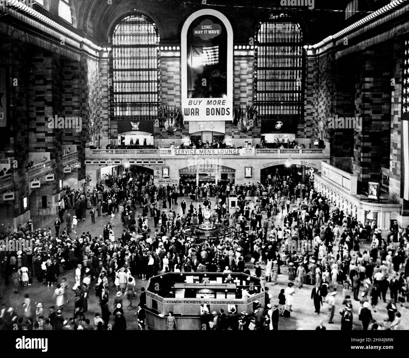 The main concourse of New York's Grand Central Station. More than 3,000 underground railway passengers fought their way to safety through acrid, choking smoke today after fire broke out in a tunnel near New York's Grand Central Station. Some passengers became hysterical and screamed in terror during a wait of more than one hour before rescuers- could start leading them out. November 28, 1949. Stock Photo