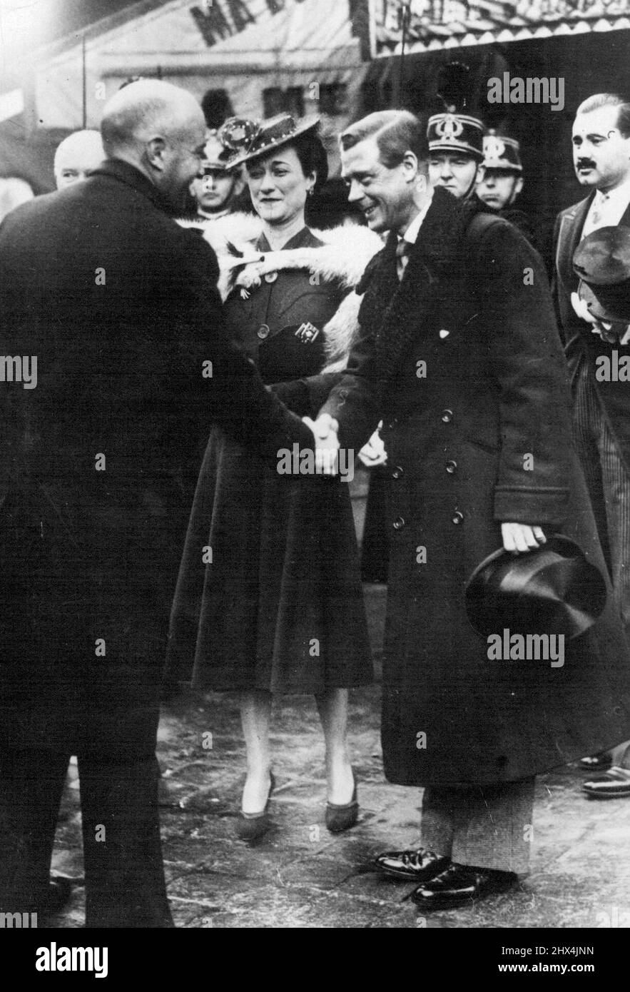 The Duke And Duchess of Windsor At American Legion Celebration in Paris. Mr. William Bulitt, American Ambassador in Paris thanking the Duke and Duchess for their Presence at the anniversary ceremony of the foundation of the American Legion Rue Ernest Pischari, where a commemoratory plaque was unveiled. March 20, 1939. (Photo by Sport and General Press Agency Limited.) Stock Photo