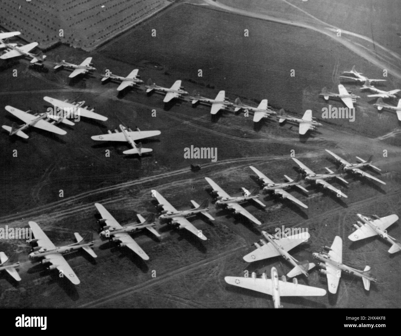 Flying Fortresses Ready For Bombing Of Germany -- Lined up and ready for combat these B-17 Flying Fortresses are only a small portion of the bombing might assembled in England by the U.S. Army Eight Air Force. Two years ago on Aug 17, 1942 an expeditionary force of 12 Flying Fortresses crossed the English Channel for the first time to drop bombs on enemy targets. Up to Aug. 24, 1944, Fortresses and Liberators of the Eight Air Force had flown 162,000 sorties to release about 300,000 tons of explosives on the enemy throughout Germany and German-invaded countries of Europe. September 15, 1944. (P Stock Photo