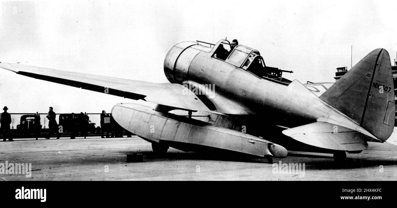 America Builds New Air Fighter For Soviet -- A view of the 'Amphibian Fighter' built by the Seversky Aircraft Corporation at Farmingdale, Long Island, U.S.A., for the Soviet Government. The plane is said to be the fastest craft of its type and of great manoeuvrability. It has a normal cruising range of 3, 000 miles with full military load and is heavily armed. Note here the flexible machine gun in the rear cockpit. The plane is one of a number being manufactured for the Red Army at the works. April 12, 1938. (Photo by Keystone) Stock Photo
