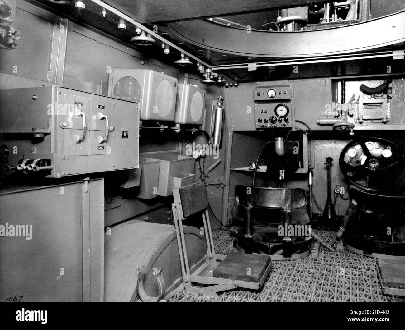A bewildering maze of instruments and controls fill the interior of the Australian-made armored cars, constructed for the Defence Department. The cars are intended for reconnaissance work, taking the place of cavalry in warfare, and by radio advise their commanding officer once they have contacted enemy forces. The car, with its crew of four, weight 4½ tons, and has a speed of 55 miles as hour. June 25, 1938. Stock Photo