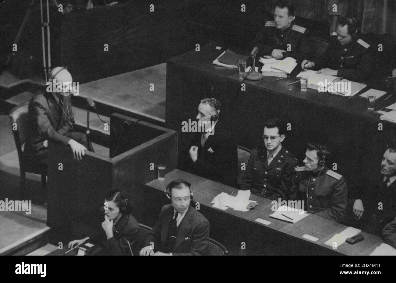 Man They Forgot: Nazi Spy Chief Gives Evidence At Nurnberg -- A General view as General Erwin Lhousen (seated left) gave his evidence before the Tribunal at Nuremberg today November 30.General Erwin Lahousen, Deputy to Admiral Canaris, chief of German intelligence from 1938 to 1943 was the prosecutions first witness at the trial of major war criminals in the palace of justice, Nuremberg today November 30. During the Lunch adjournment the accused men raved. Coerins shouted: 'Traitor - That's one man we forgot on July 20th, declaring that he was going to try and get into the Witness - box himsel Stock Photo
