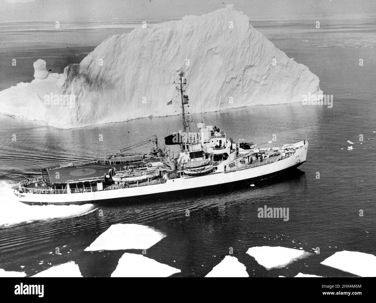 Greenland Cosmic Ray Scientific Expedition by the U.S. Office Of Naval Research -- During the summer months of August and September 1952, the U.S. Office of naval ray investigations in the vicinity of the geemagnetic pole in Northern Greenland. These measurement were made with scientific instruments and instrumented rockets carried  to high altitudes by large constant level plastic balloons (Skyhooks) launched Prem the deck of the Ice breaker U.S.C.G.C. Eastwind while cruising in Baffin Bay. The Purpose of these experiments was to measure the charge and energy spectrum of the primary cosmic ra Stock Photo