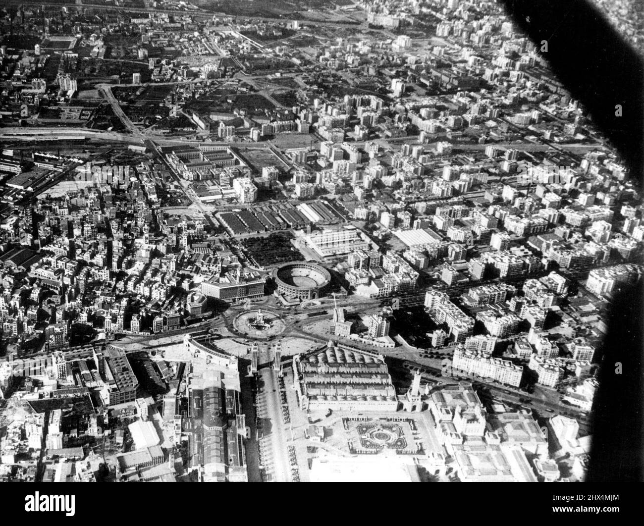 Spanish Government Prepares last stand for Barcelona: Franco's troops only Five Miles Away -- A new aerial picture of Barcelona. With Franco's troops only Five miles from the City. The Spanish Government is making hurried preparations for a last stand for Barcelona, Catalonia. As Nationalist bombers carried out successive raids over the port, the Government mobilized all available men ready to thrust them into the front line. A British destoyer is standing by to take off British residents. January 23, 1939. Stock Photo