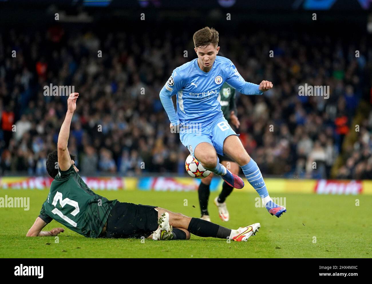 Sporting Lisbon's Luis Neto (left) and Manchester City's James McAtee battle for the ball during the UEFA Champions League round of sixteen second leg match at the Etihad Stadium, Manchester. Picture date: Wednesday March 9, 2022. Stock Photo
