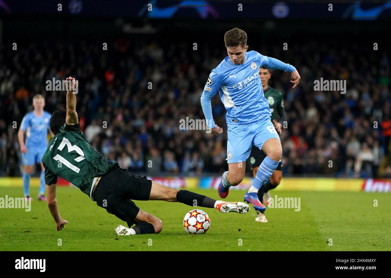 Sporting Lisbon's Luis Neto (left) and Manchester City's James McAtee battle for the ball during the UEFA Champions League round of sixteen second leg match at the Etihad Stadium, Manchester. Picture date: Wednesday March 9, 2022. Stock Photo