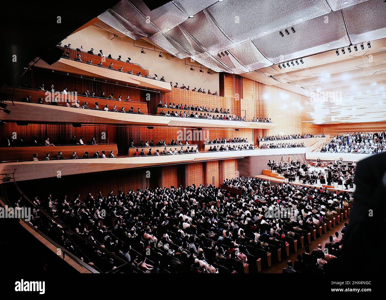 New York, United States. 09th Mar, 2022. A photo of the newly renovated David Geffen Hall is displayed on a flat screen in New York City on Wednesday, March 9, 2022. The New York Philharmonic's home will reopen in October 2022, a year and a half ahead of schedule, after construction was accelerated during the pandemic. Photo by John Angelillo/UPI Credit: UPI/Alamy Live News Stock Photo