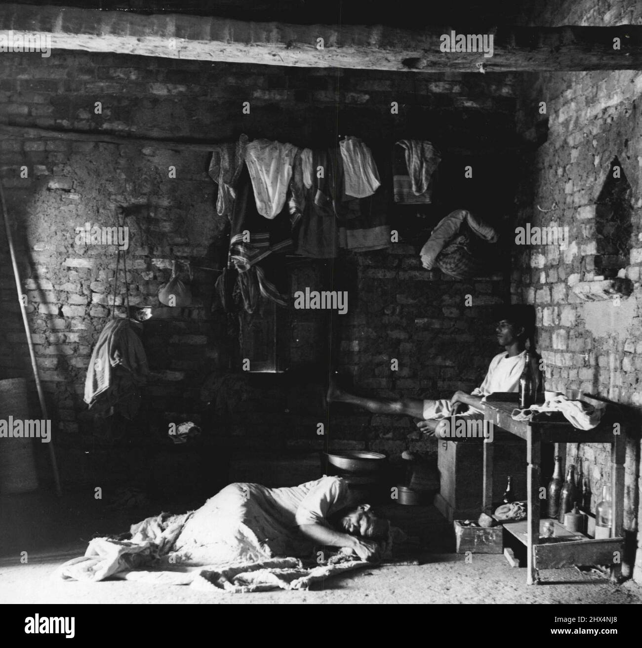 A Village In India -- In this squalid room live Sako and his family ...