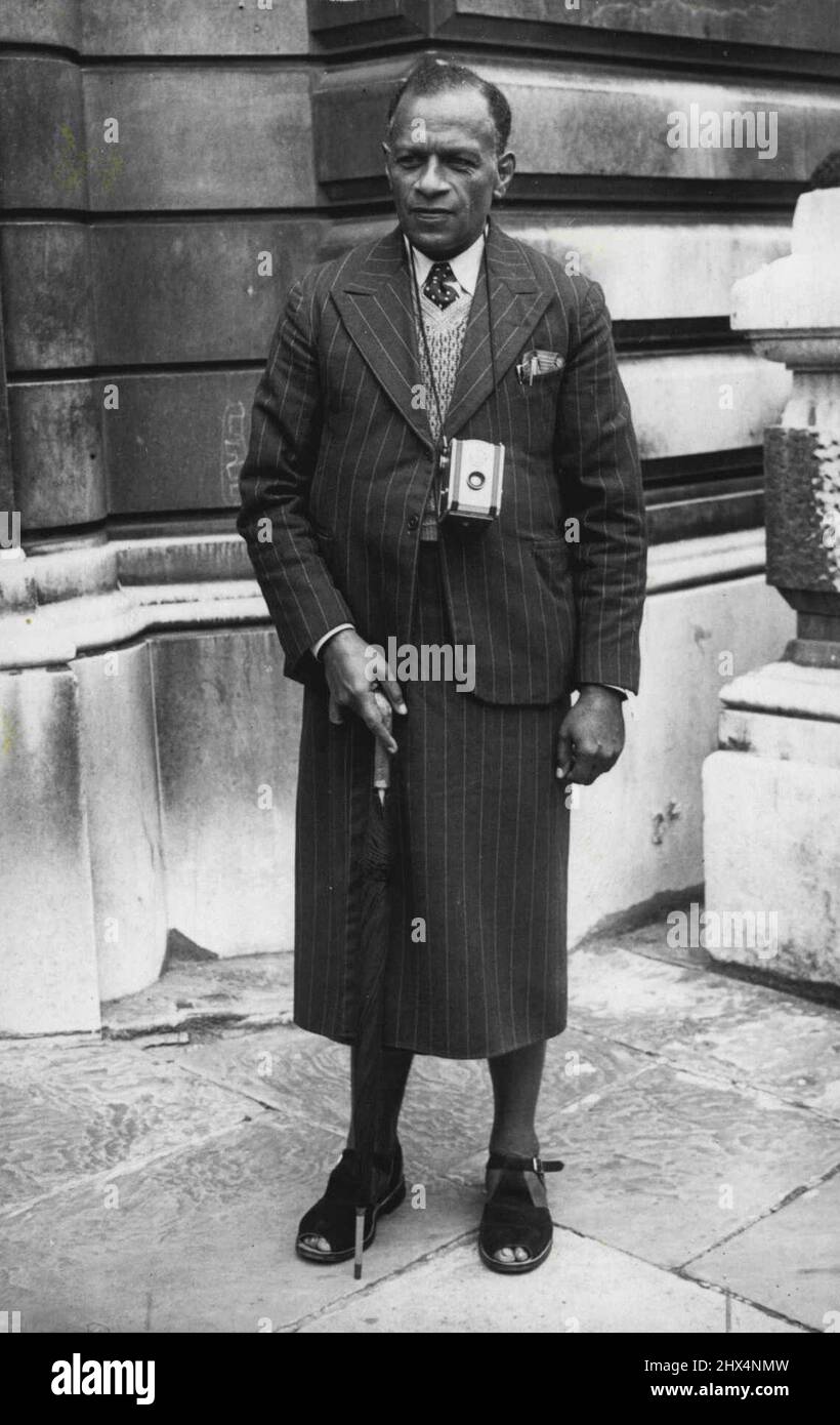 He Weaves The Skirt -- Mr. Joeli Kete Ravai, wearing a costume which ...