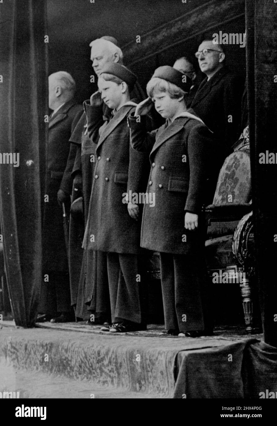 Baudouin I - The Life Story Of A Young Prince -- The young Princess Baudouin and Albert watch the annual great military Spring Parade instaurated by King Albert in celebration of his birthday. April 08, 1940. (Photo by Paul Popper Ltd.). Stock Photo