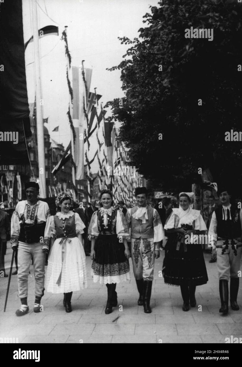 5th Reich Congress 'Strength through Joy' in Hamburg.    On July 20 the 5tE Reich Congress of the NS-recreative movement 'Strength through Joy' was opened in Hamburg by the Reich Organizing Director of the NSDAP Dr. Ley. Representatives of 21 nations took part in this Congress. Slovaks in their many-coloured national costumes are taking a stroll in the streets of Hamburg. July 9, 1947. Stock Photo