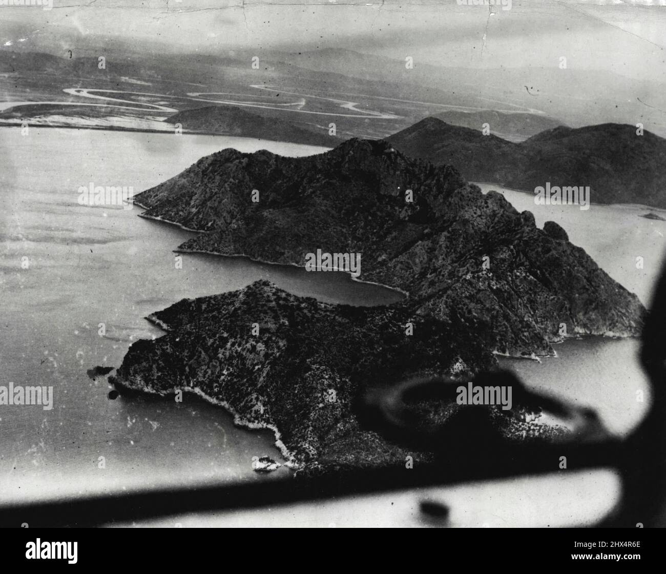 In Flight With The Graf Zeppelin To The Holy Land -- A view of the island of Crete in the Mediterranean, as seen from the Graf Zeppelin in flight from Berlin to the Holy Land. This is one of the pictures made by Robert Hartman staff photographer for the Hearst News Service which produces the MGM News and the International Newsreel. November 04, 1929. (Photo by Robert Hartman, MGM News Photos). Stock Photo
